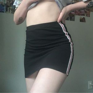 black brandy melville slip skirt with red and white stripes